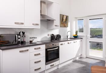 The kitchen is light, airy and filled with modern appliances making it a dream to rustle up delicious meals in!