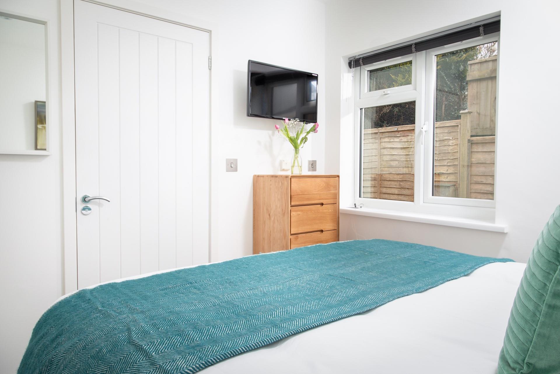 A TV in the bedroom allows you to spend a lazy morning in bed catching up on your favourite shows!