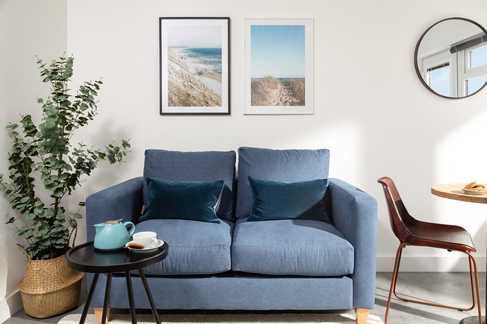 Seaside hues and sunny beach prints give the apartment a nautical feel and remind you just how close to the sea you are!