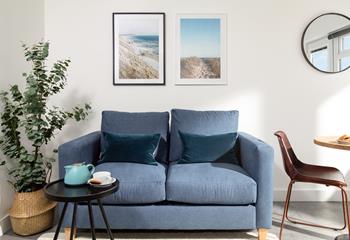 Seaside hues and sunny beach prints give the apartment a nautical feel and remind you just how close to the sea you are!