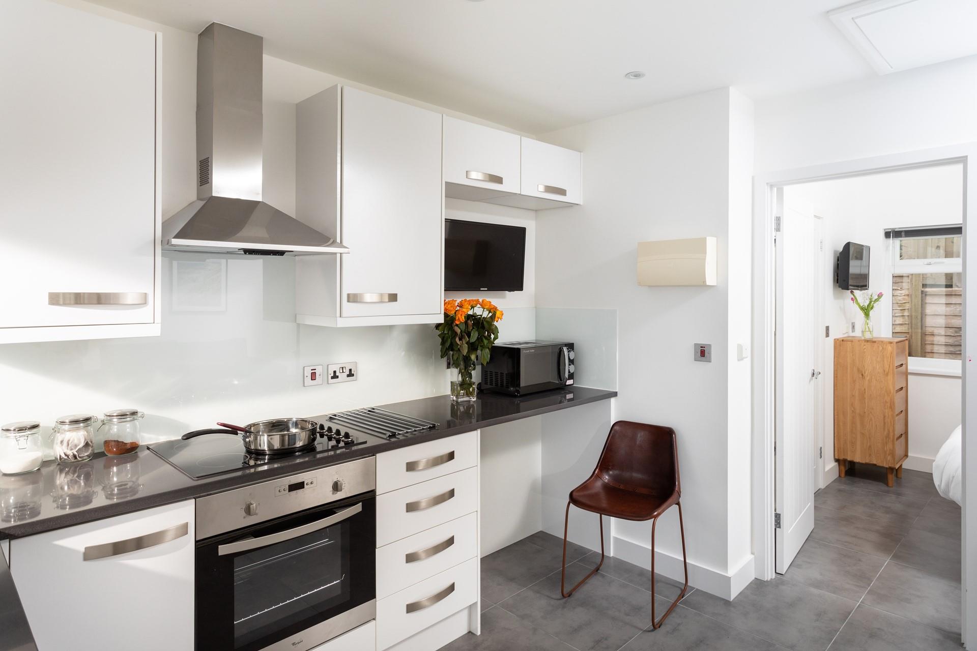 The kitchen is compact but carefully thought out to maximise space and fully equipped with everything needed to cook delicious meals!