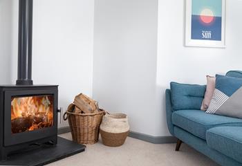 The woodburner is perfect for snuggling up next to on cooler summer evenings or crisp winter days!