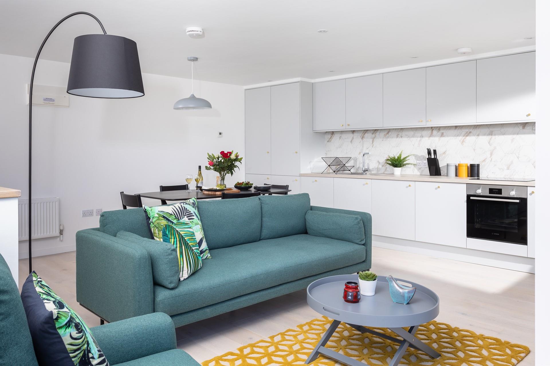 The stylish, modern kitchen makes cooking a breeze in this luxurious property. 