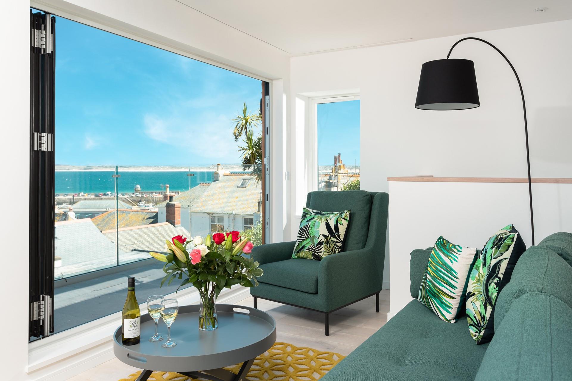 Watch the sunset from the comfort of your sofa with a glass of something tasty in hand. 