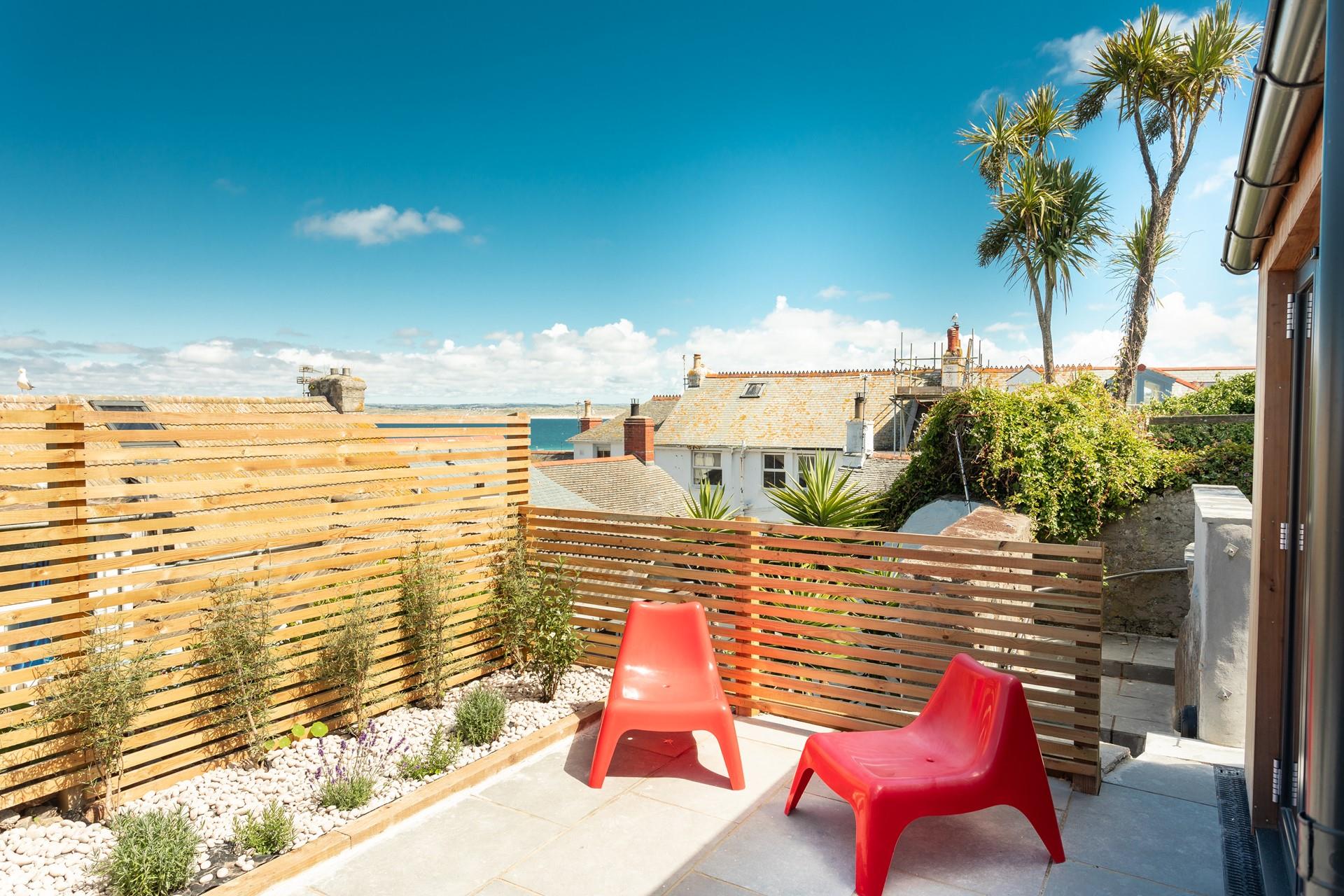 You can catch glimpses of the sea from your garden, the perfect place to relax and plan the next day. 