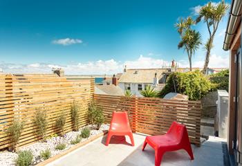 You can catch glimpses of the sea from your garden, the perfect place to relax and plan the next day. 