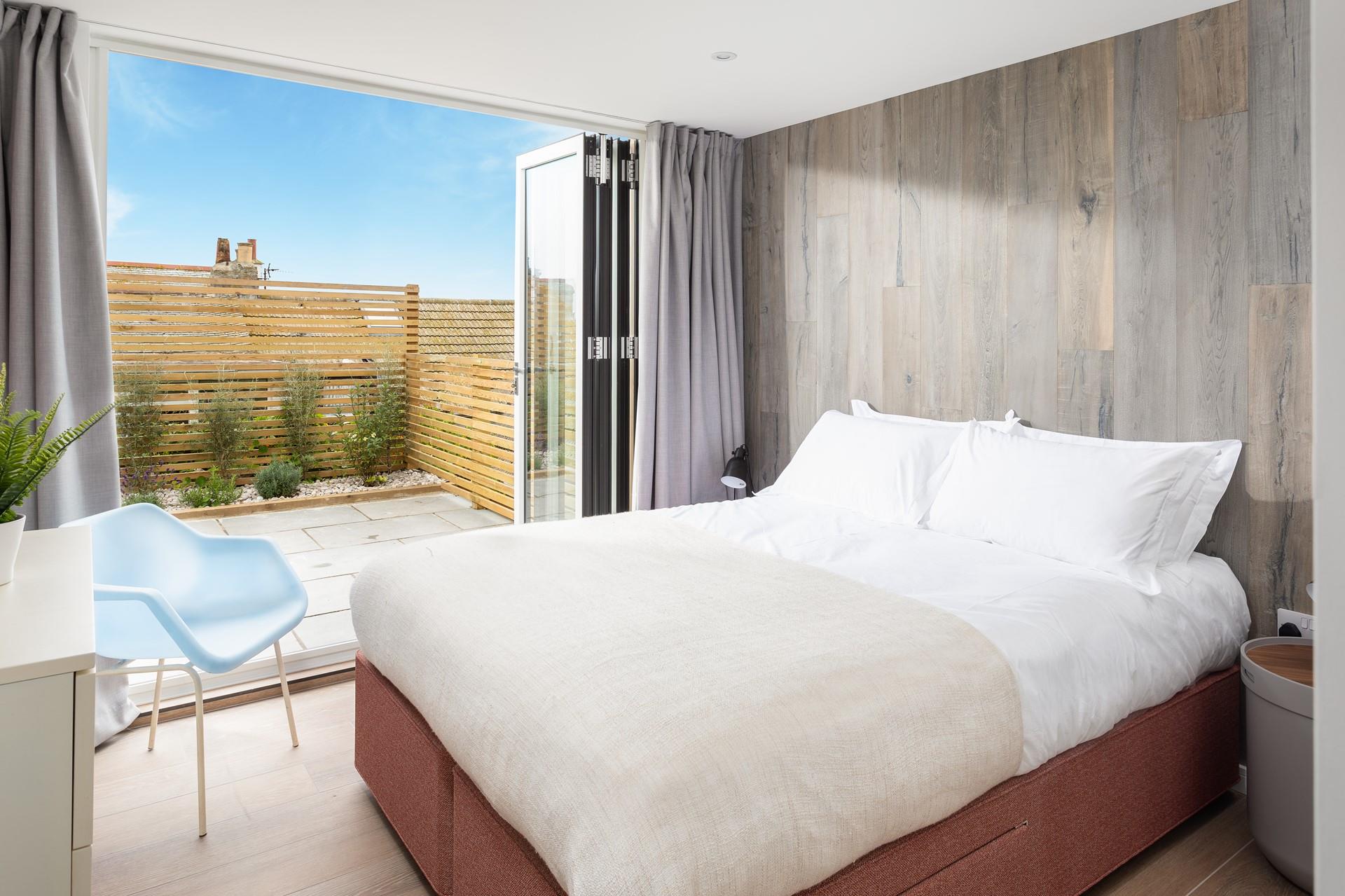 Let the light flood your bedroom and relax in luxury whilst listening to the bird chirp in the morning sun.