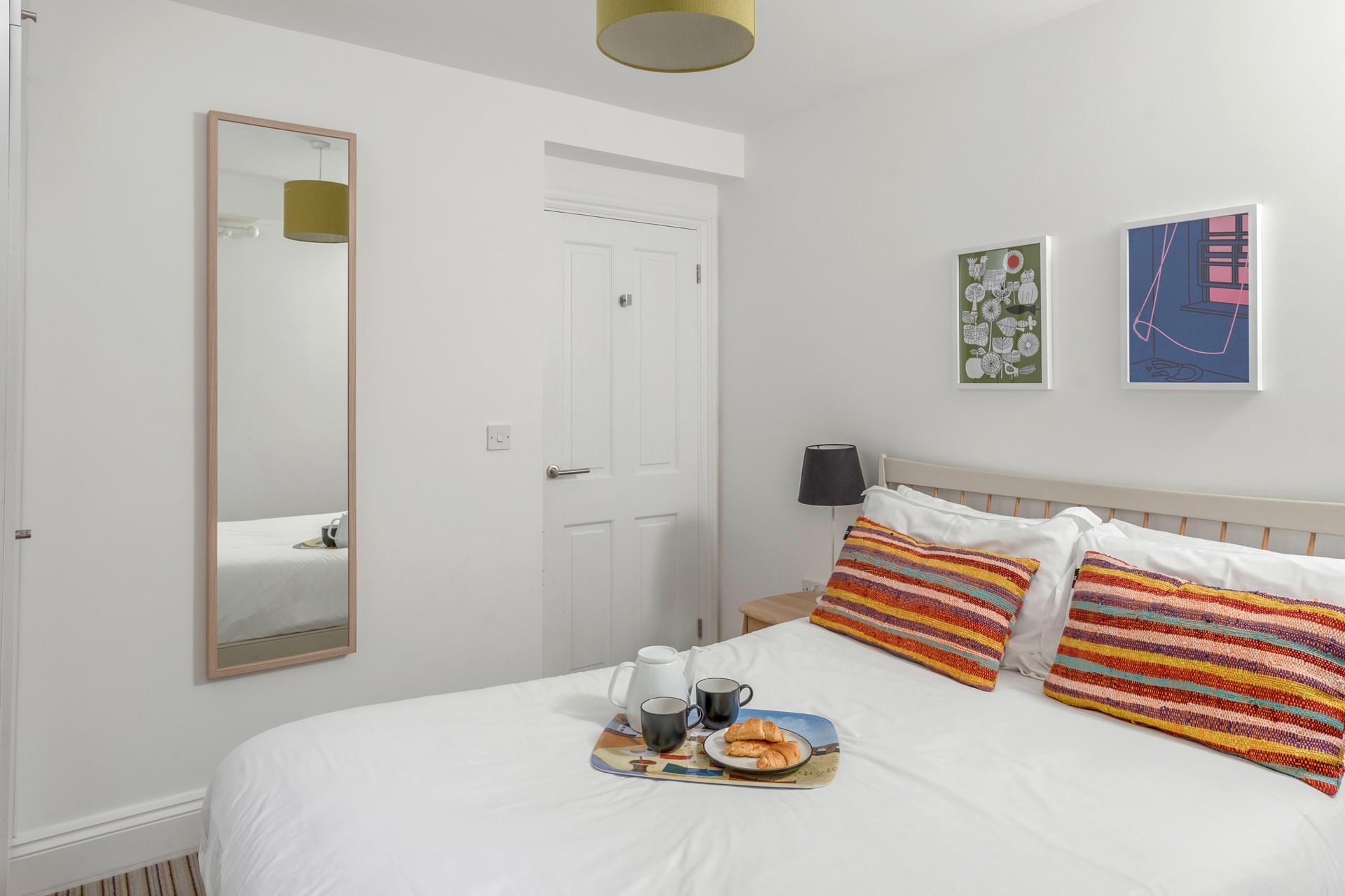 The comfortable double bed offers a peaceful night's sleep, leaving you rested and ready for the day ahead.