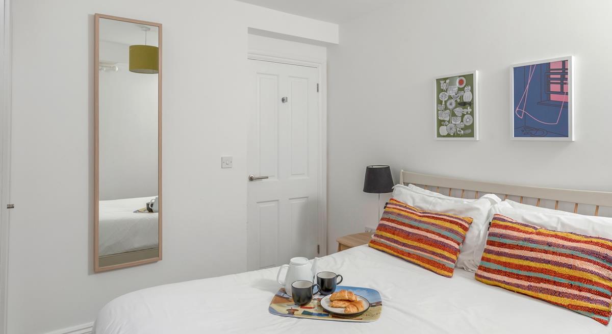 The comfortable double bed offers a peaceful night's sleep, leaving you rested and ready for the day ahead.