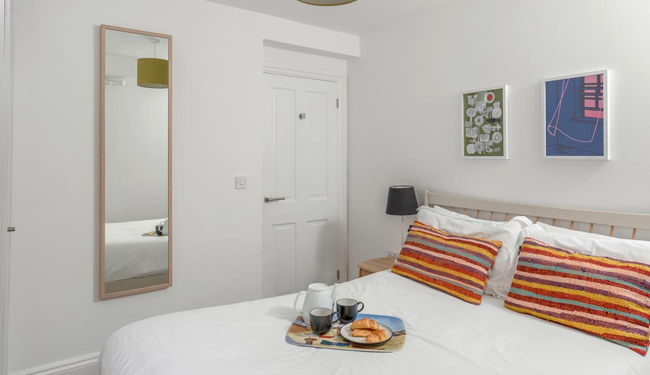 The comfortable double bed offers a peaceful night's sleep, leaving you rested and ready for the day ahead.