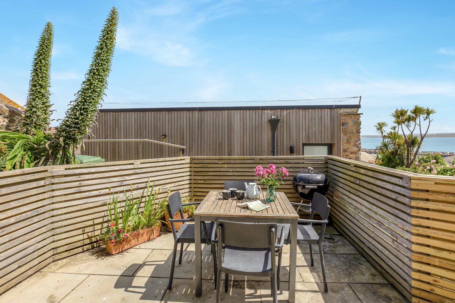 Spend summer evenings dining al fresco with the dreamy sounds of the seaside in the distance.