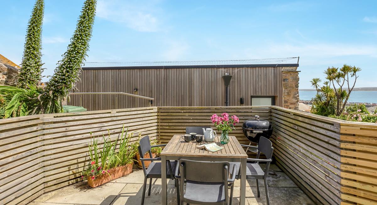 Spend summer evenings dining al fresco with the dreamy sounds of the seaside in the distance.