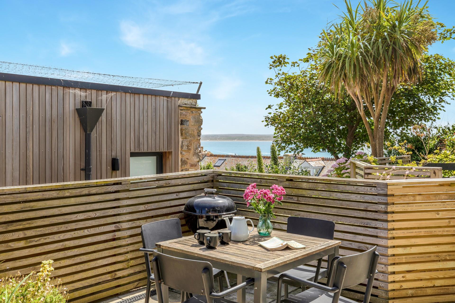 Enjoy a cuppa in the secluded garden area whilst admiring the spectacular views.