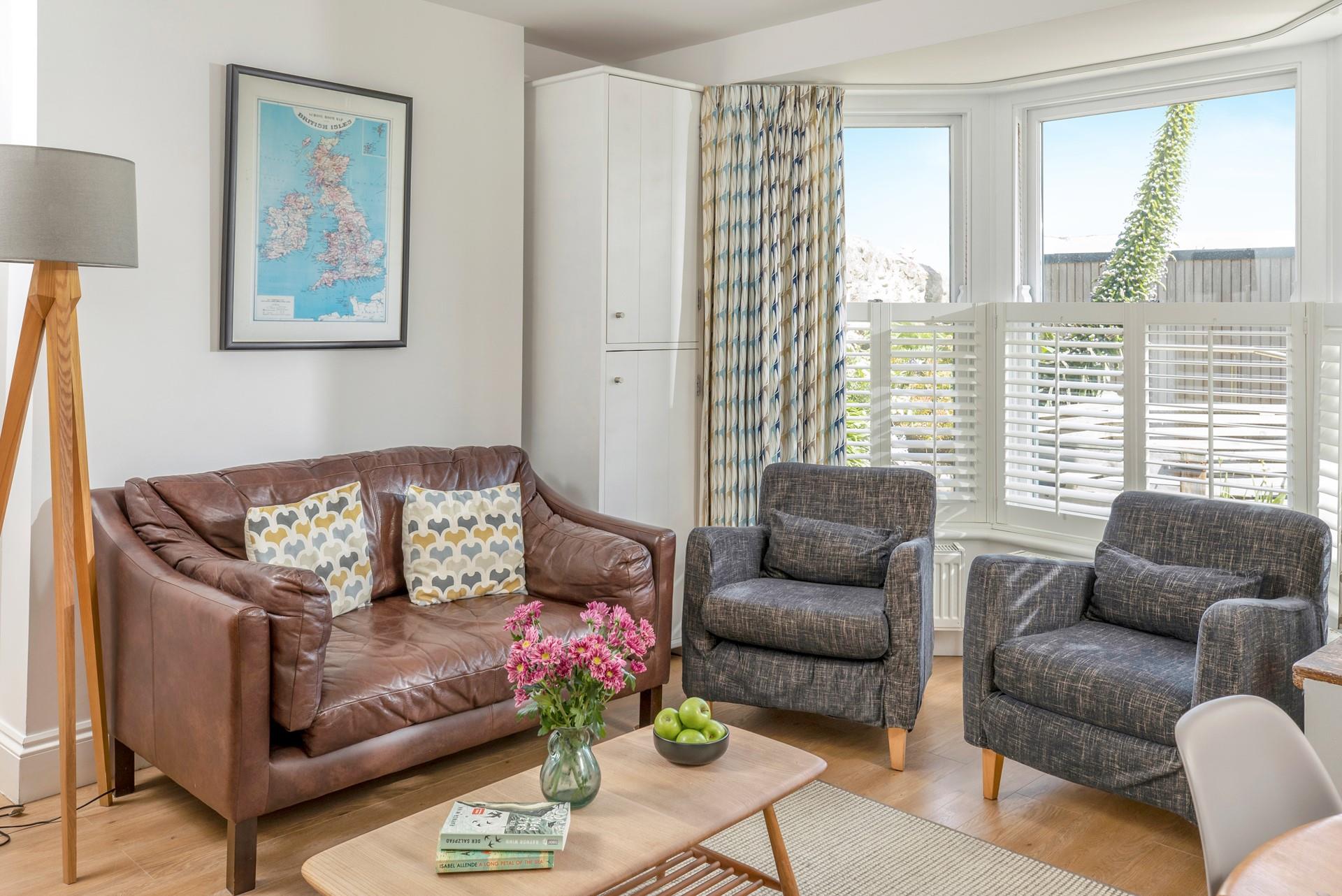 Snuggle down on the sumptuous sofa after a busy day exploring Cornwall's rugged coastline.