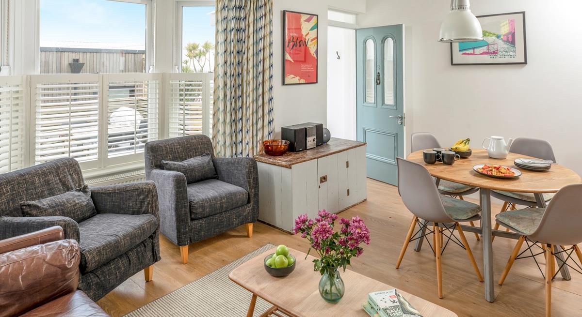 Soft seaside tones have created a relaxing haven where you can enjoy an evening of films and games.