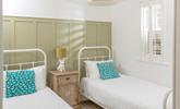 The twin bedroom is perfect for both kids or friends sharing. - Thumbnail Image