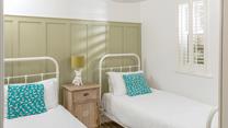 The twin bedroom is perfect for both kids or friends sharing.