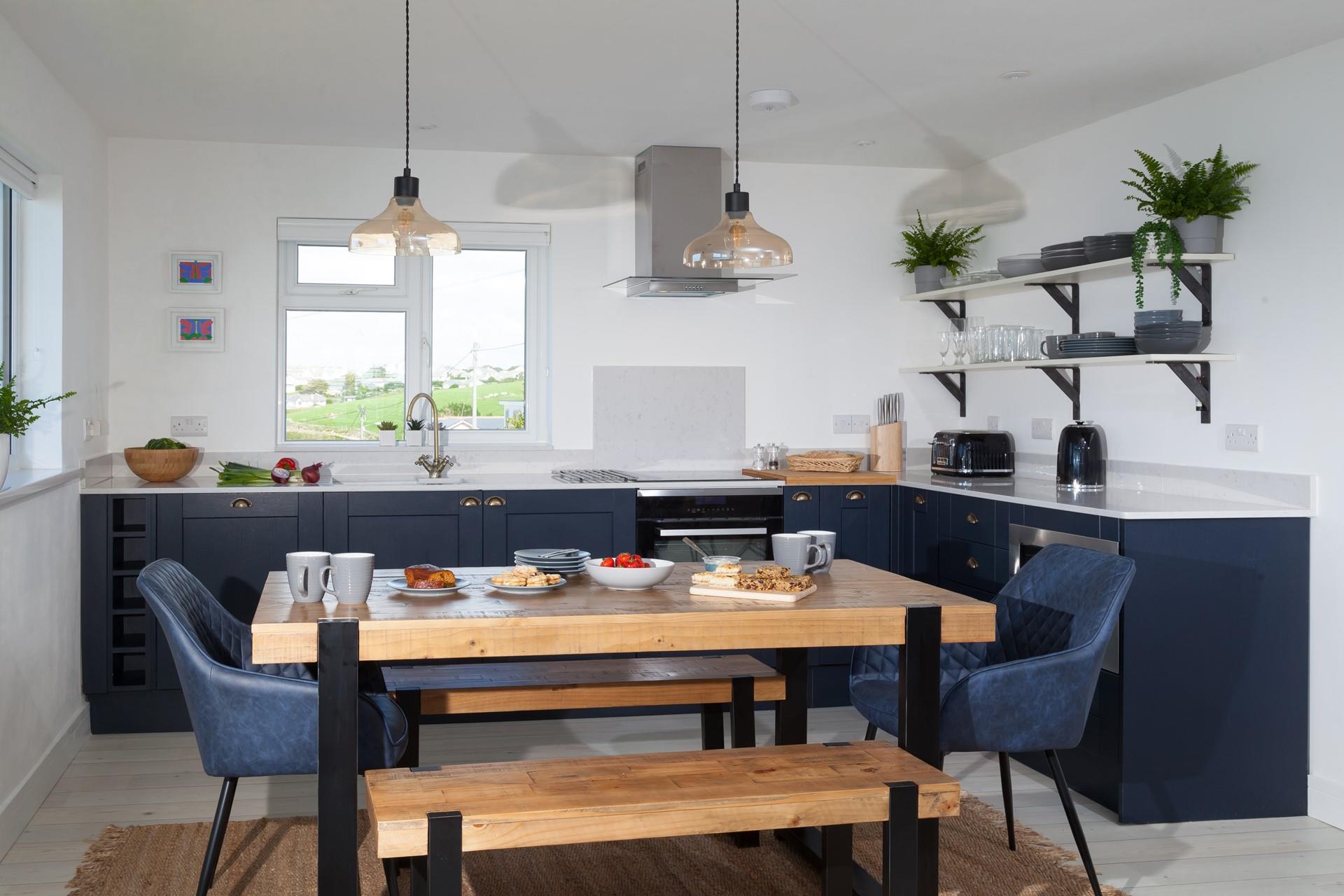 The chic kitchen and dining space is a delight to cook and eat in.