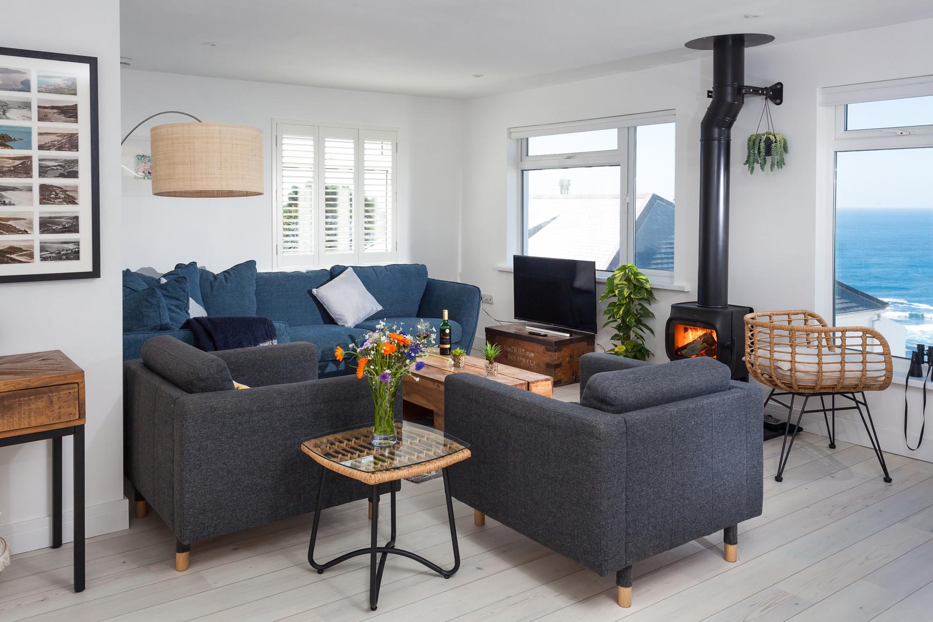 The cosy living space is the perfect spot for storm-watching.