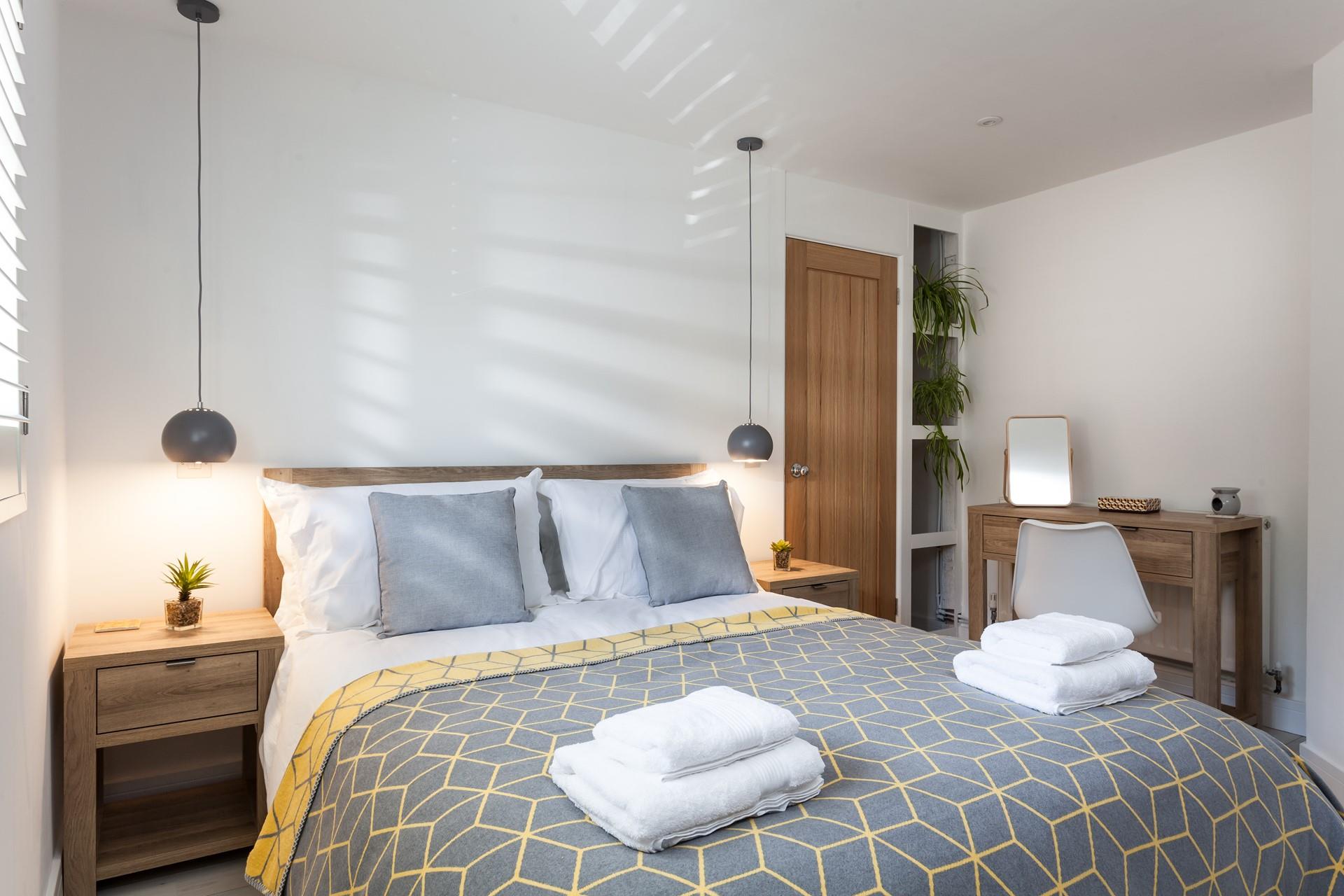 Sink into the deep king size mattress for a restful sleep.