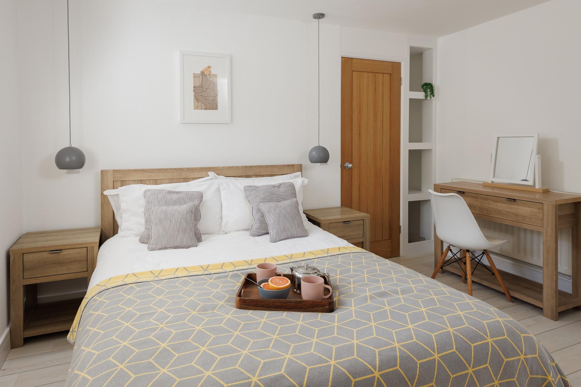 Sink into the deep king size mattress for a restful sleep.