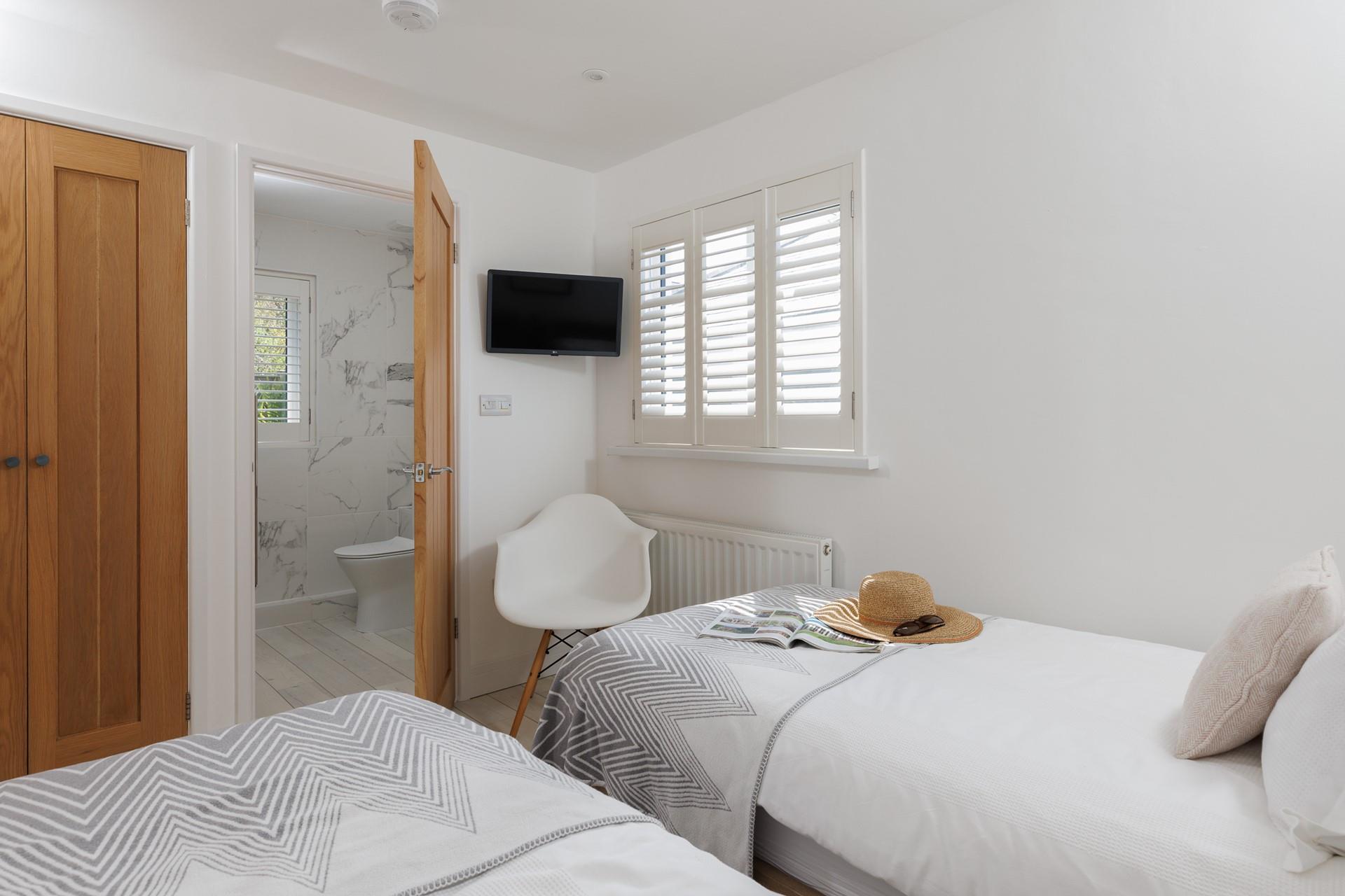 The bedrooms have all you need for a relaxing stay with family or friends.