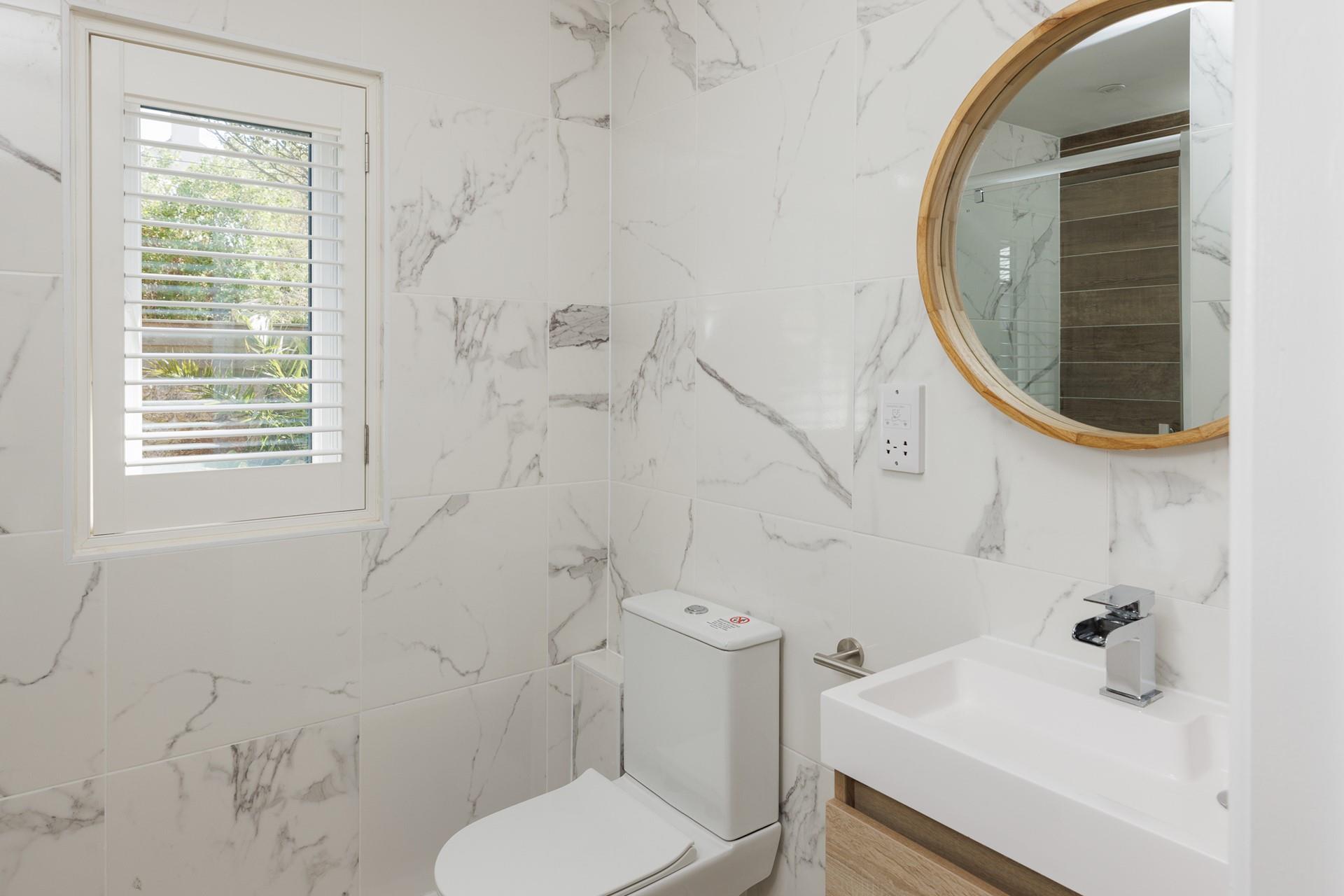 Spa-like decor creates a calming feel in each en suite.