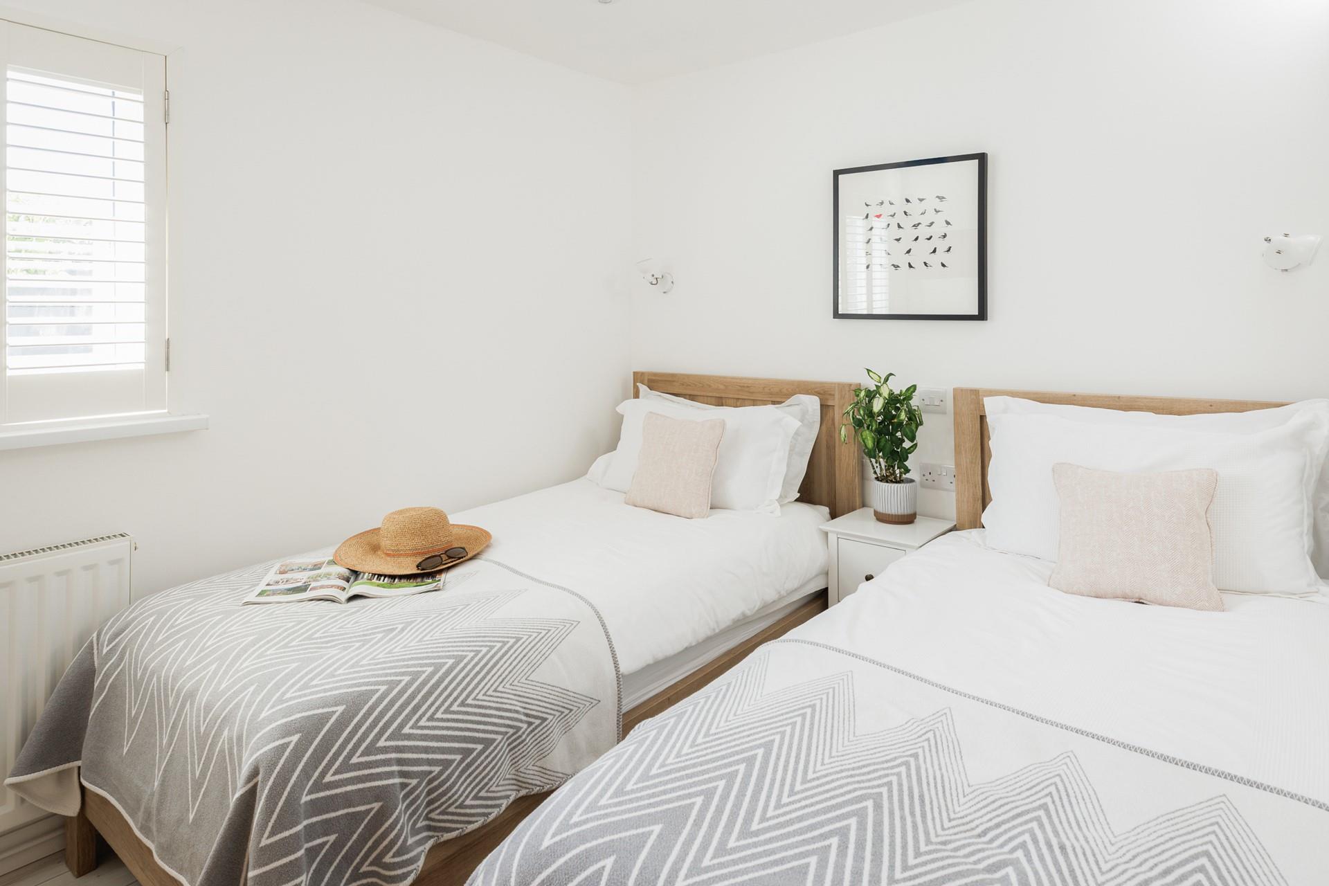 Twin beds are suitable for adults and children alike.