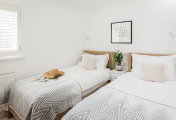 Twin beds are suitable for adults and children alike.