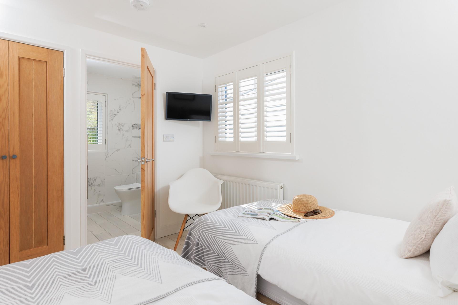 Bedroom 1 has an en suite shower room.
