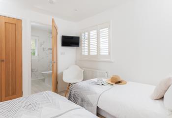 Bedroom 1 has an en suite shower room.