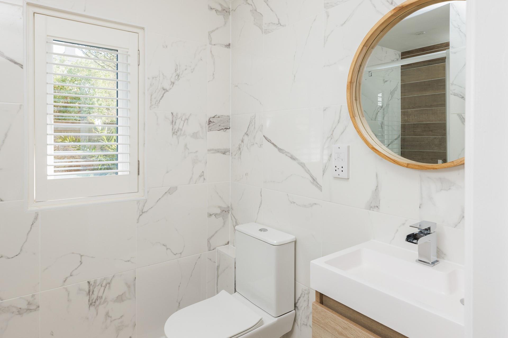 Spa-like decor creates a calming feel in each en suite.