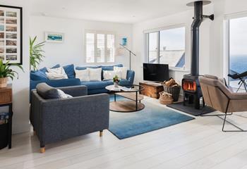 Relax in the sitting area, watching the ever-changing ocean vista.