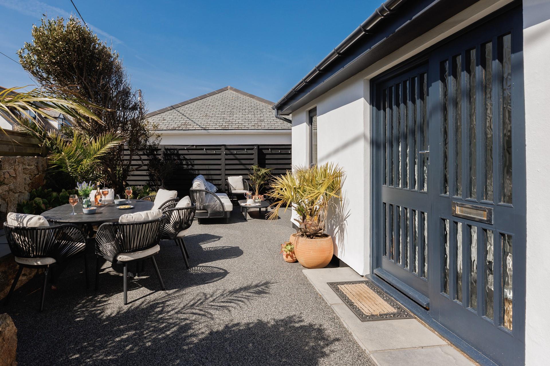 The patio area is bathed in light from sunrise to sunset!
