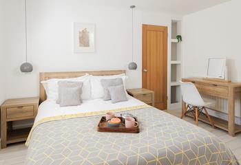 Sink into the deep king size mattress for a restful sleep.