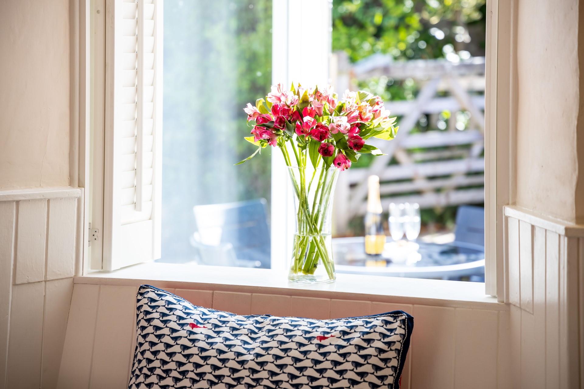 The window seat is perfect for getting stuck into a good book with a cool crisp glass of wine.