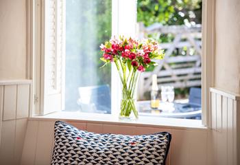 The window seat is perfect for getting stuck into a good book with a cool crisp glass of wine.