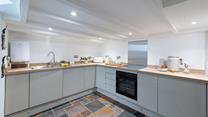 Great for entertaining with its well-equipped kitchen, making dinner parties easy.