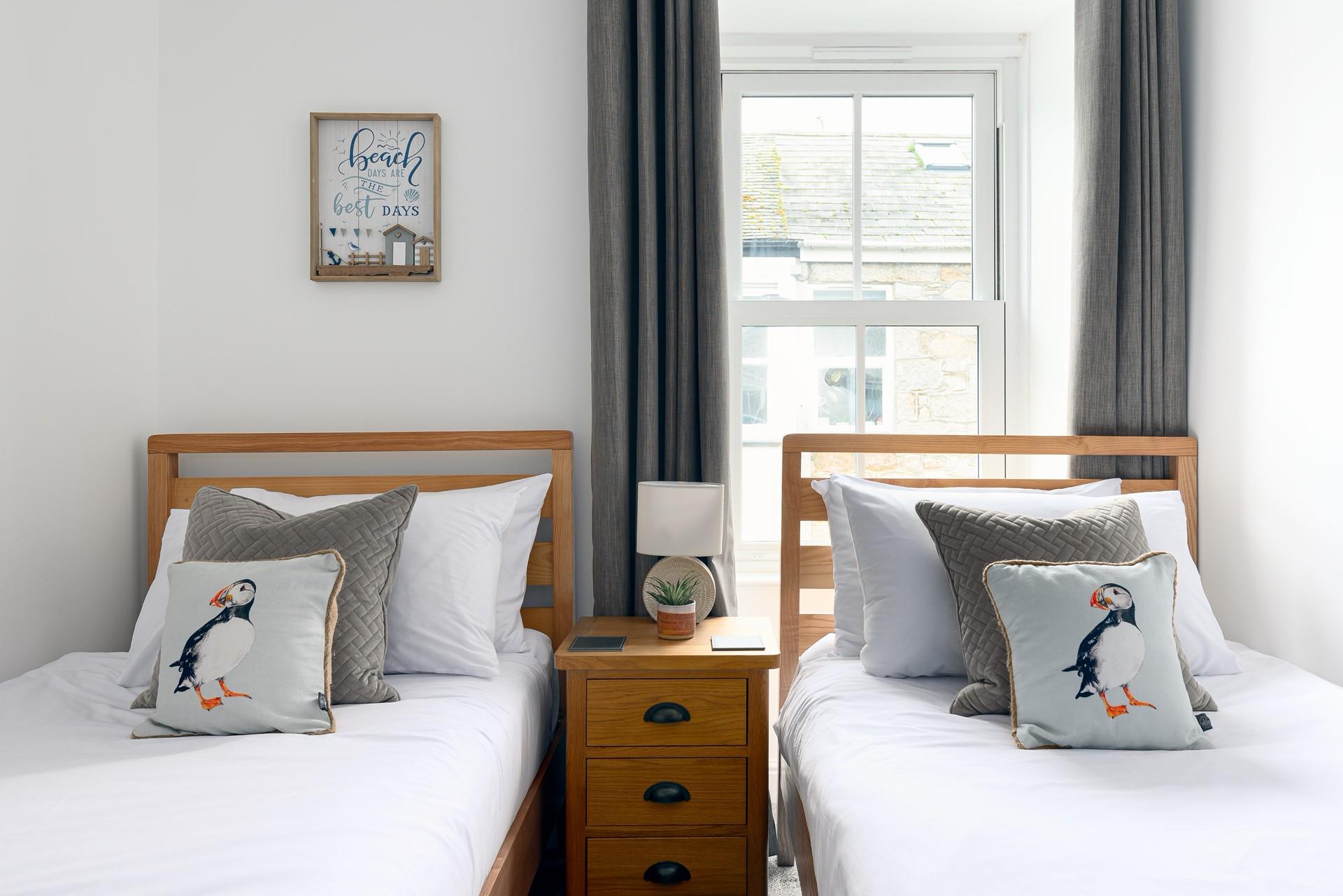 Tuck the little ones into the twin beds after a day spent on the beach.