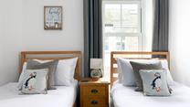 Tuck the little ones into the twin beds after a day spent on the beach.
