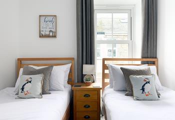 Tuck the little ones into the twin beds after a day spent on the beach.