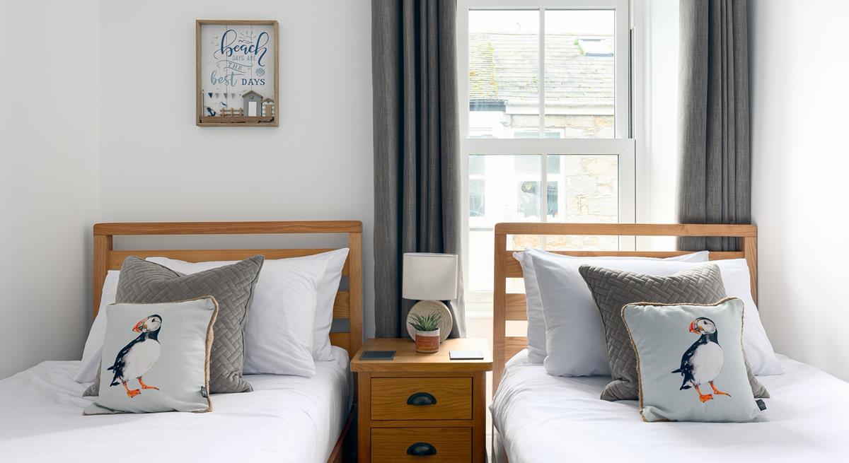 Tuck the little ones into the twin beds after a day spent on the beach.