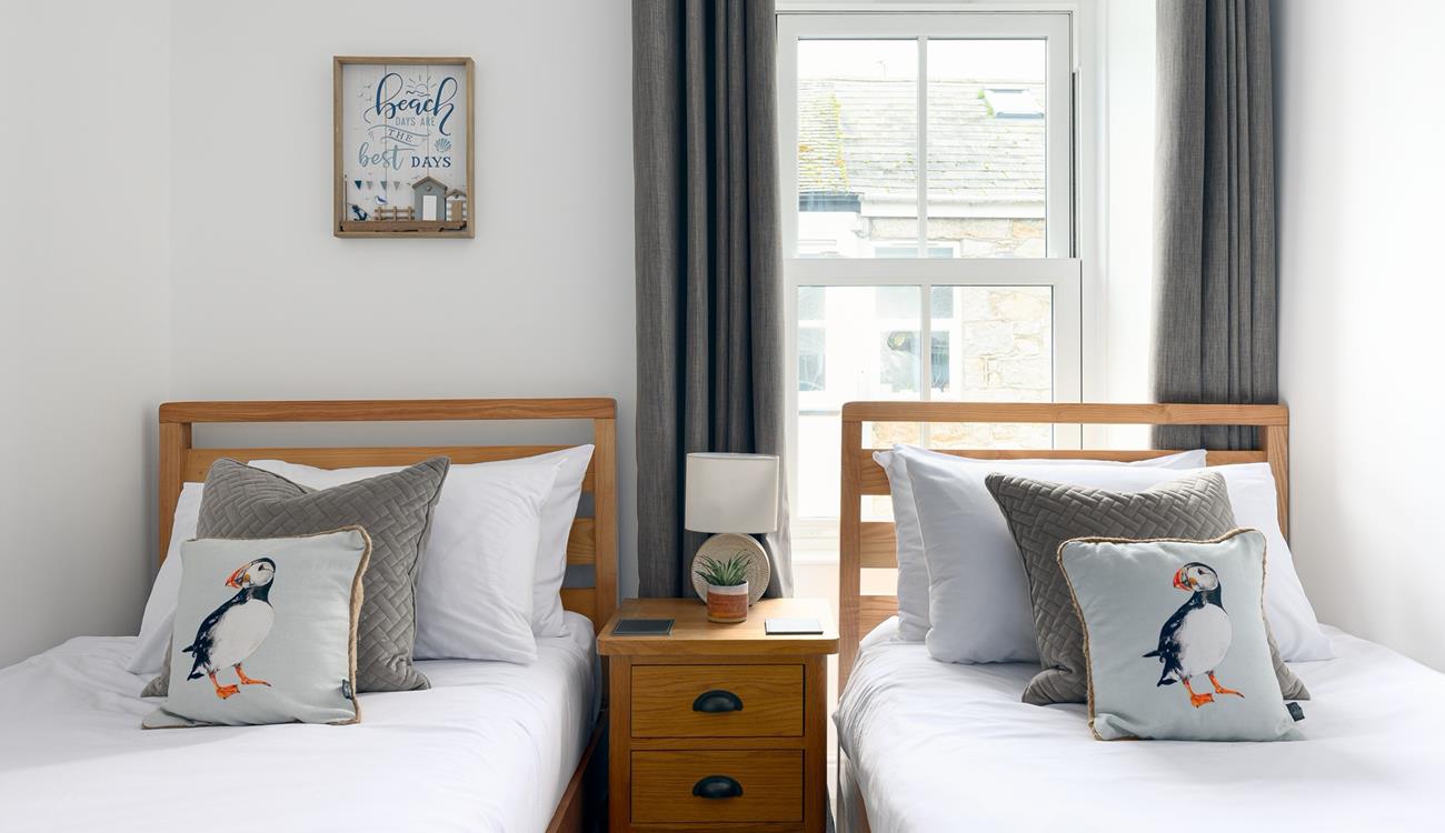 Tuck the little ones into the twin beds after a day spent on the beach.