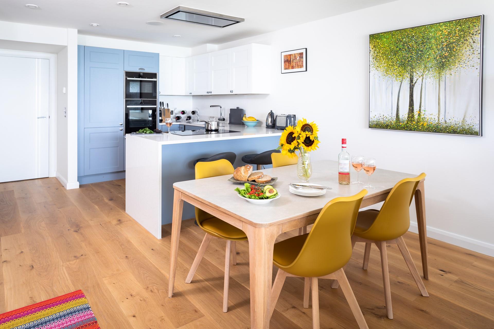 Keep the cook of the family company, with a breakfast bar and stools.