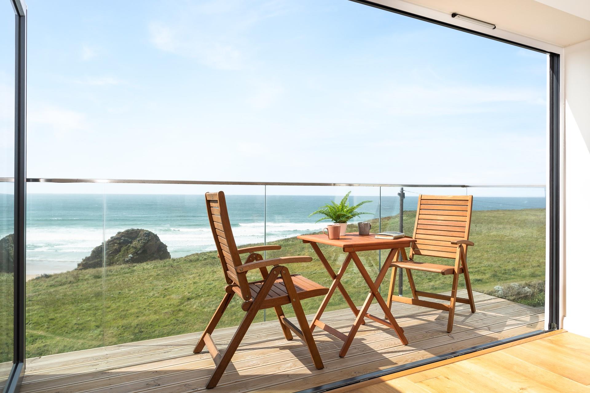 Sit on the balcony and watch the sun set with a glass of your favourite drink on a summer's evening.