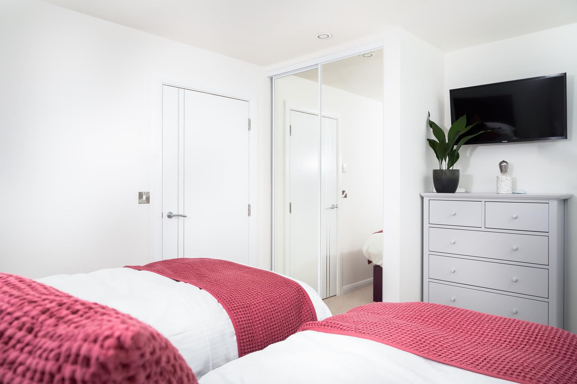 Zip and link beds in bedroom 2, provides flexible sleeping arrangements for children and adults.