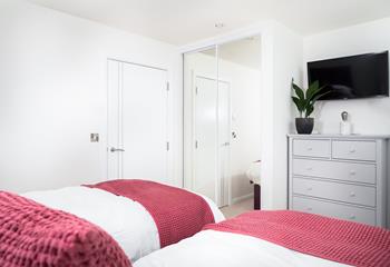 Zip and link beds in bedroom 2, provides flexible sleeping arrangements for children and adults.