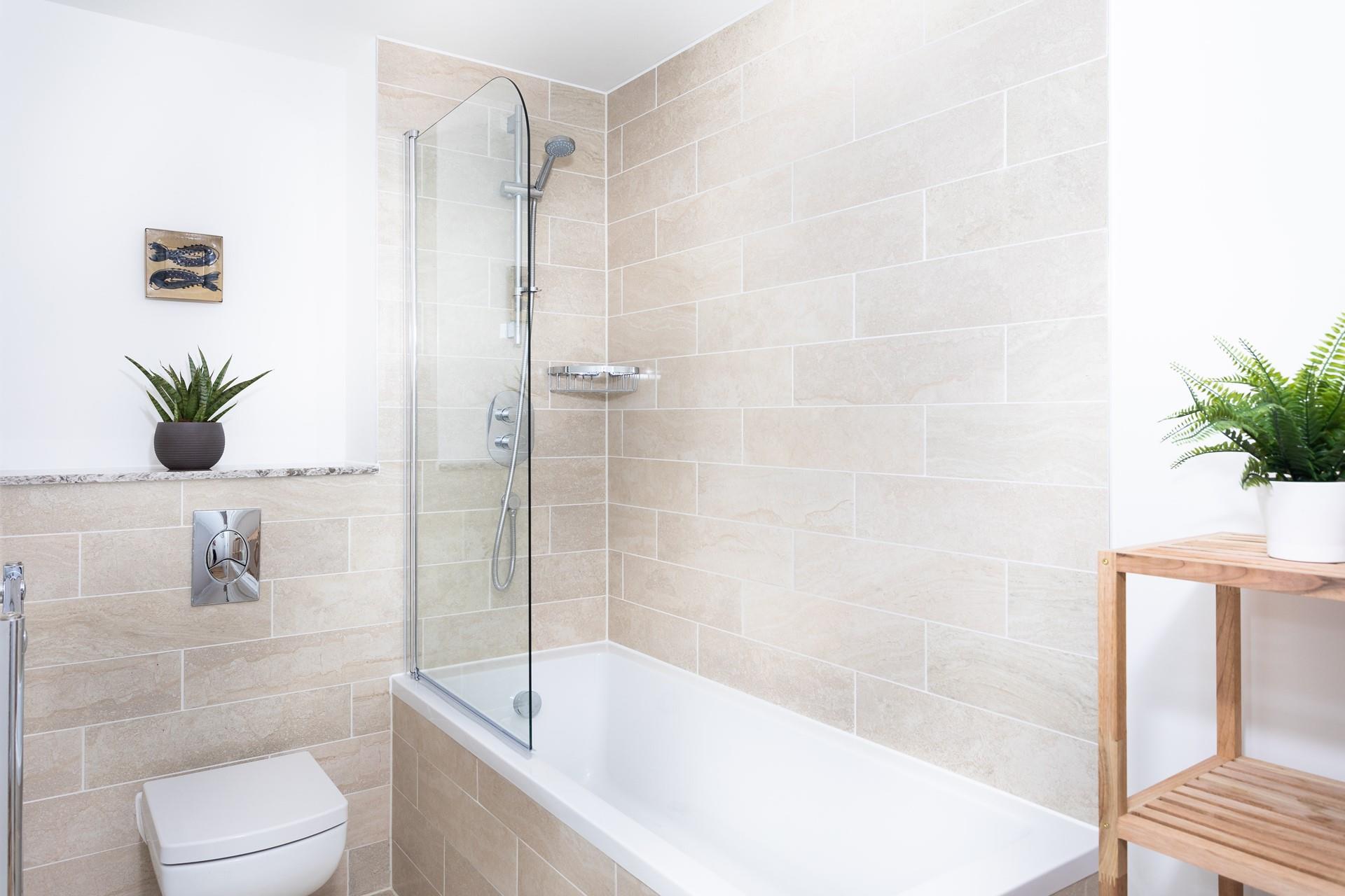 The family bathroom offers a bath and shower, so you can relax after a busy day at the beach.