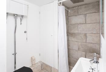 Wash off your sandy toes in the walk-in rainfall shower.