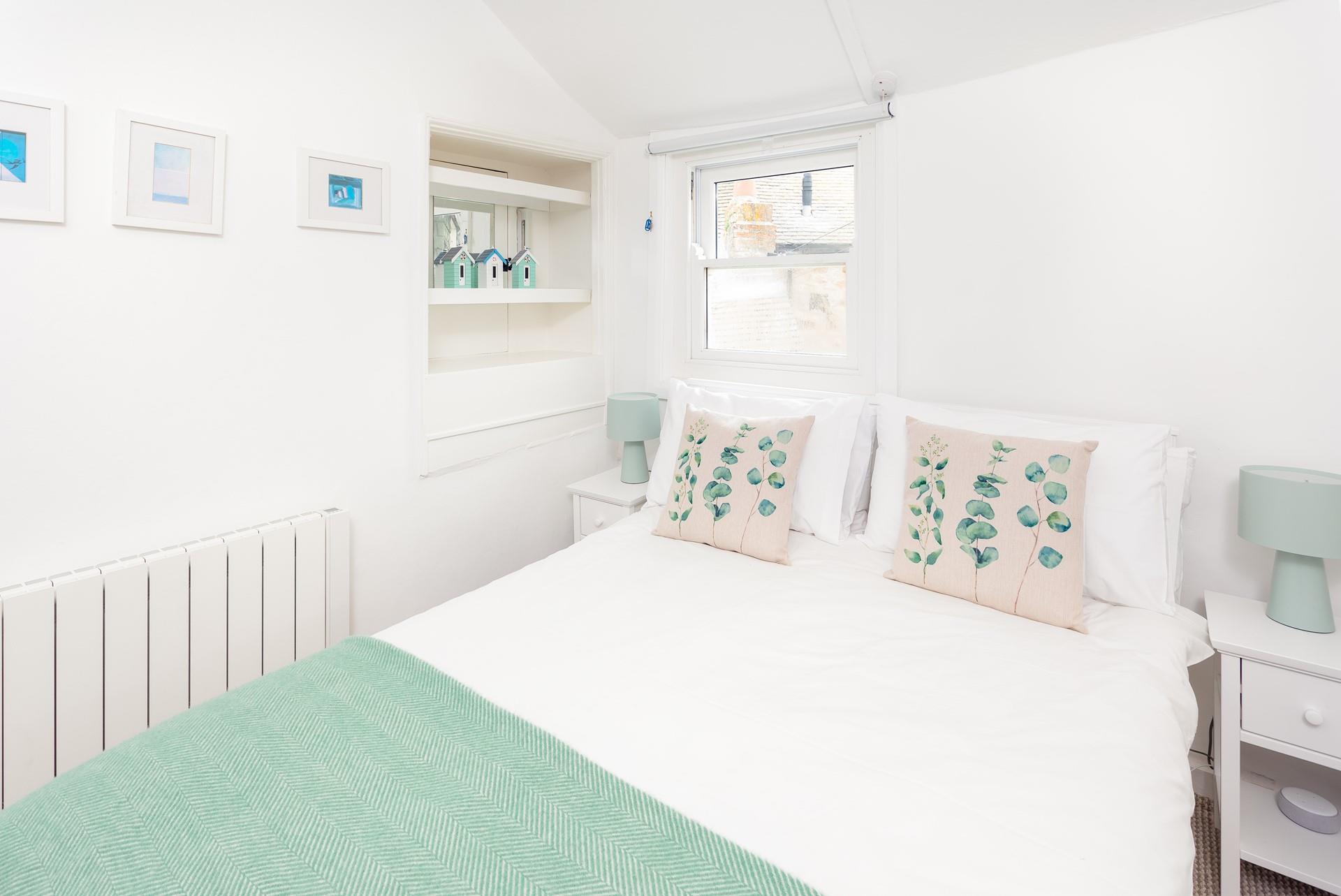 Guests love the exceptionally comfy beds and seaside-themed decor.